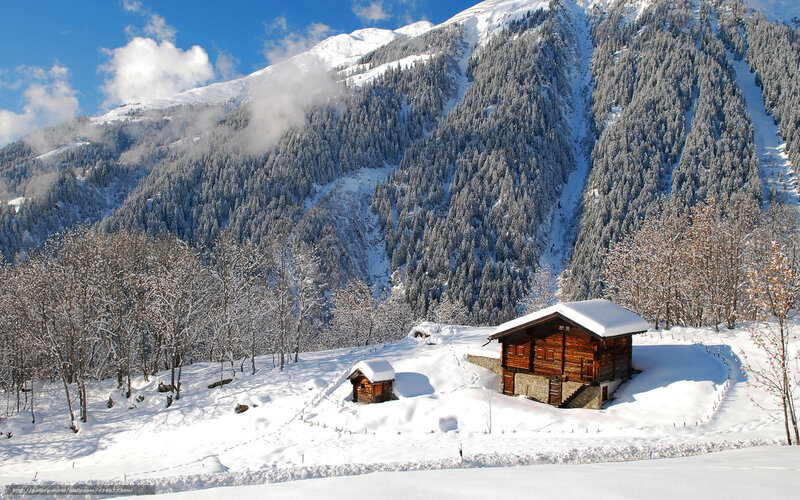 Snowy mountain cabin scene