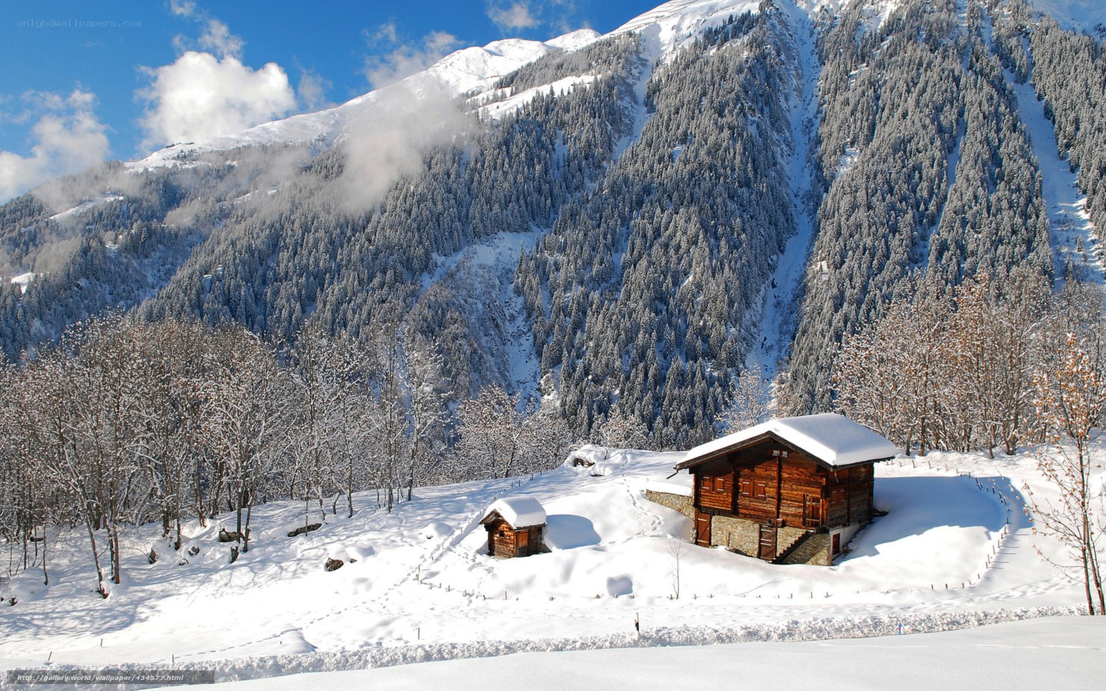 Snowy mountain cabin scene