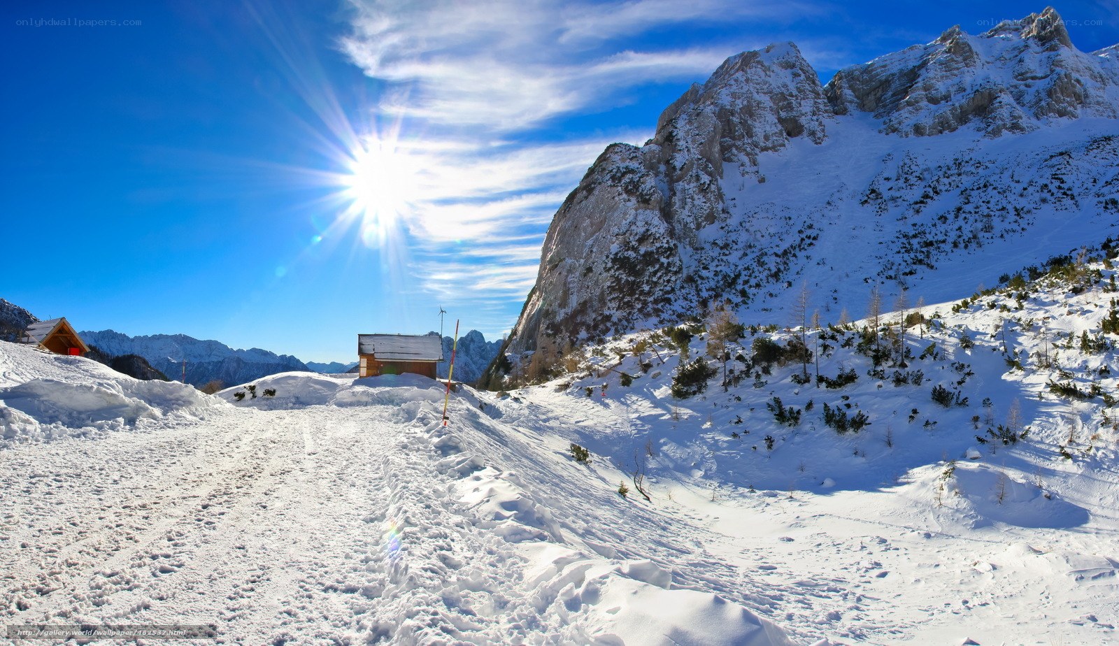 Snowy mountain cabin scene