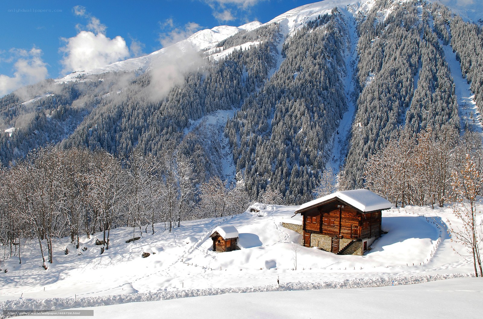 Snowy mountain cabin scene