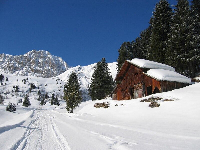 Snowy mountain cabin scene