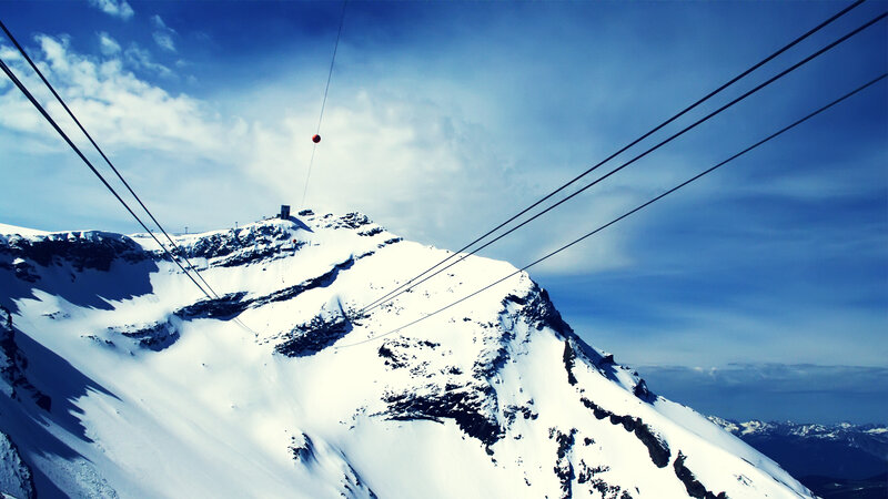 Snowy mountain cable car view