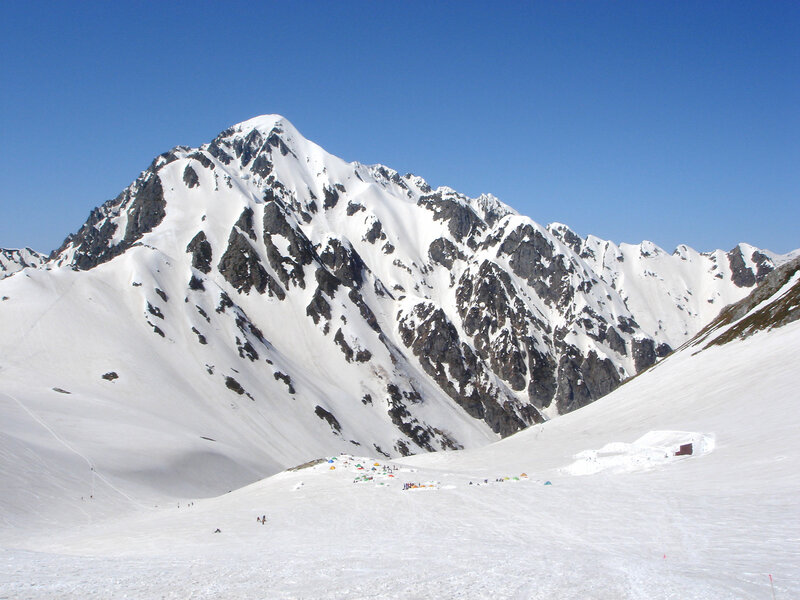 Snowy mountain campsite
