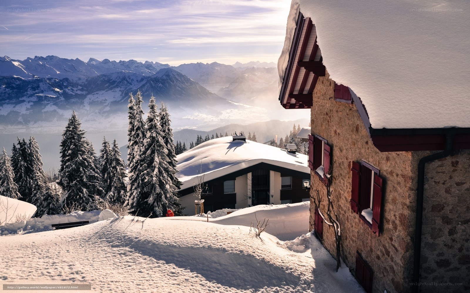 Snowy mountain chalet view