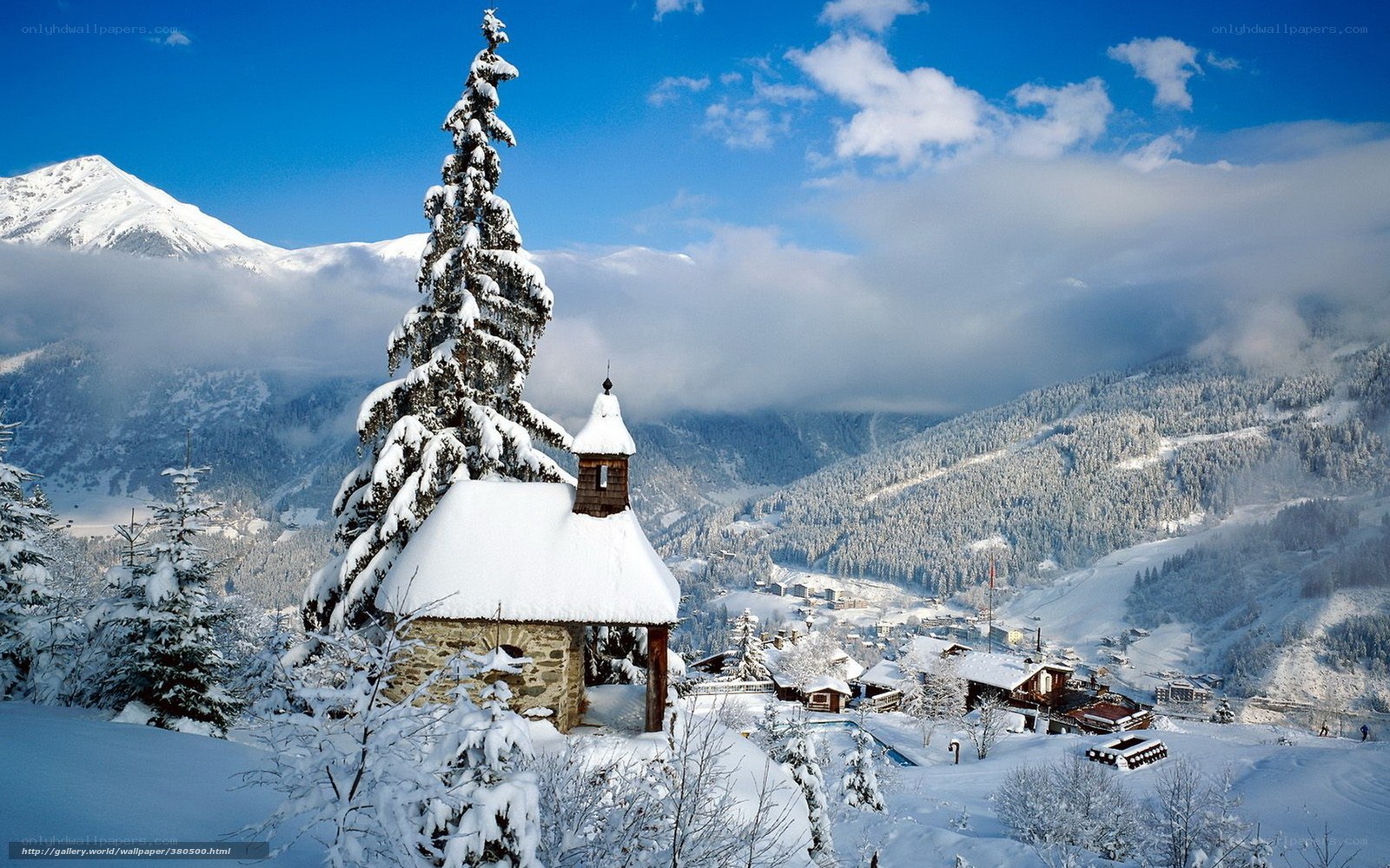Snowy mountain chapel scene