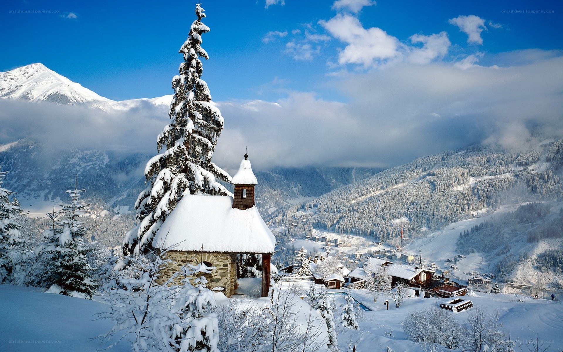 Snowy mountain chapel scene
