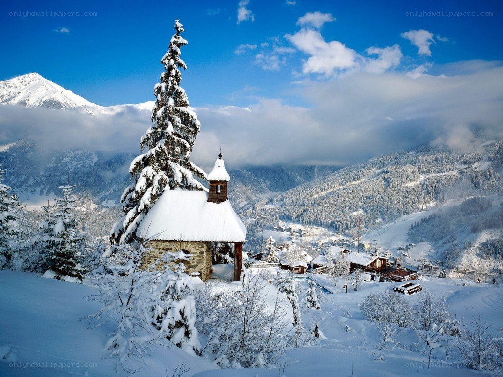 Snowy mountain chapel scene