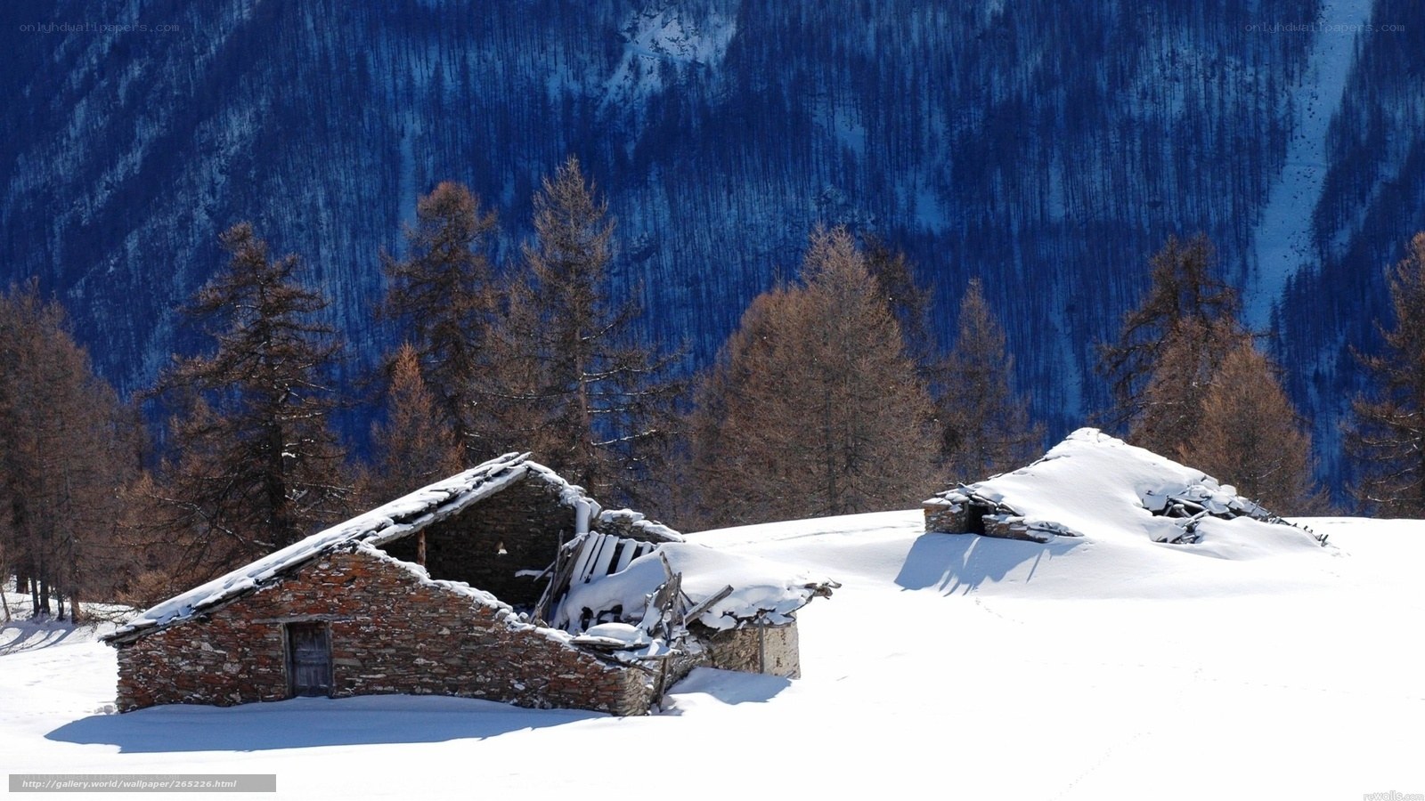 Snowy mountain hut ruins