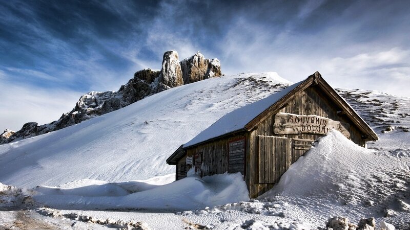 Snowy mountain hut with souvenir shop