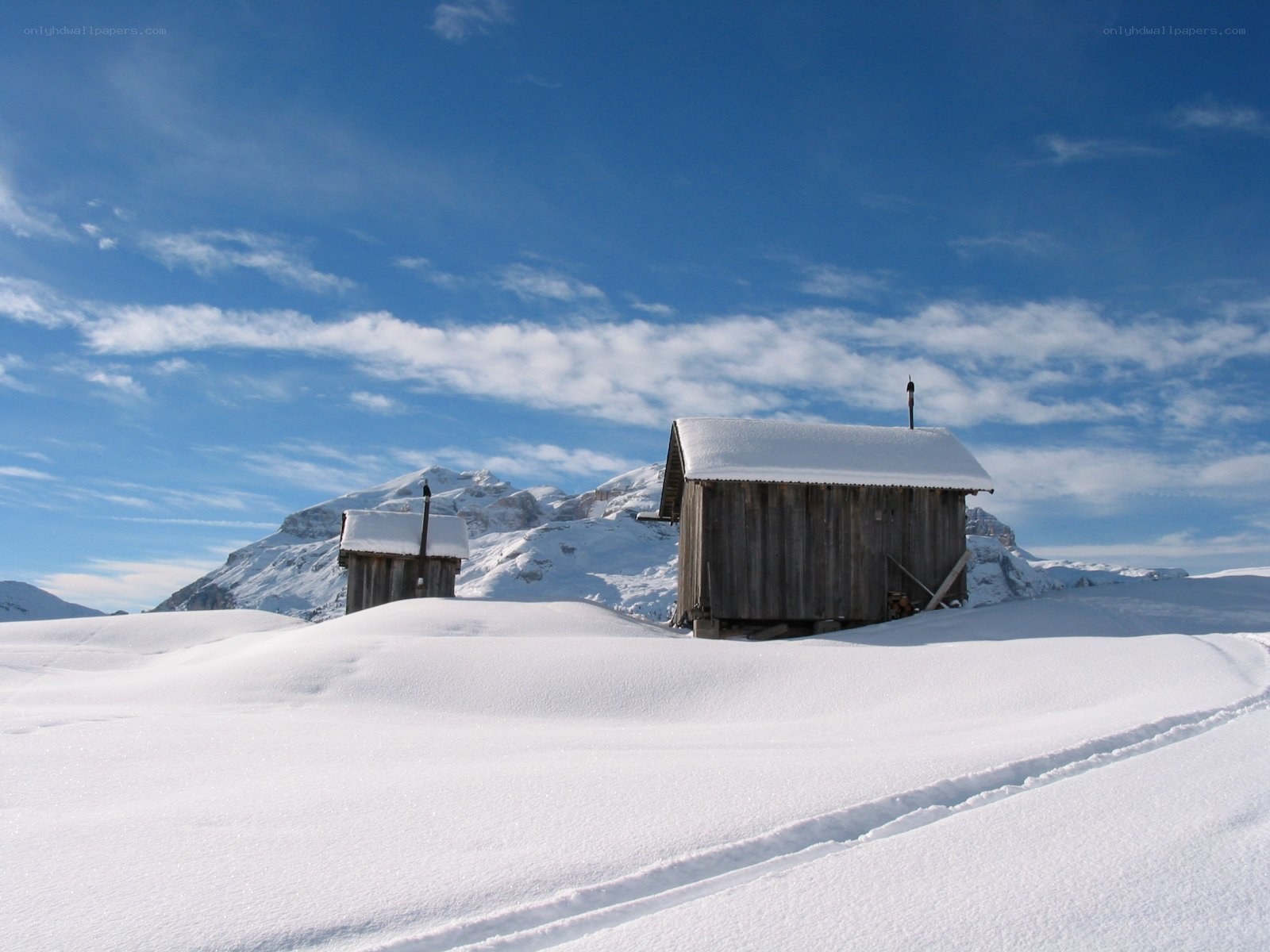 Snowy mountain huts