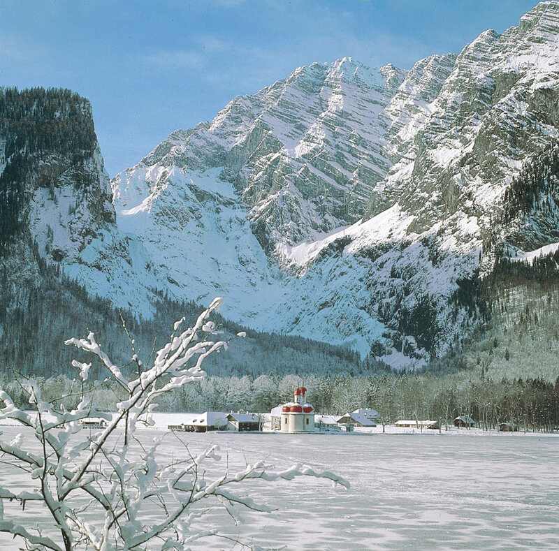 Snowy mountain lake in winter