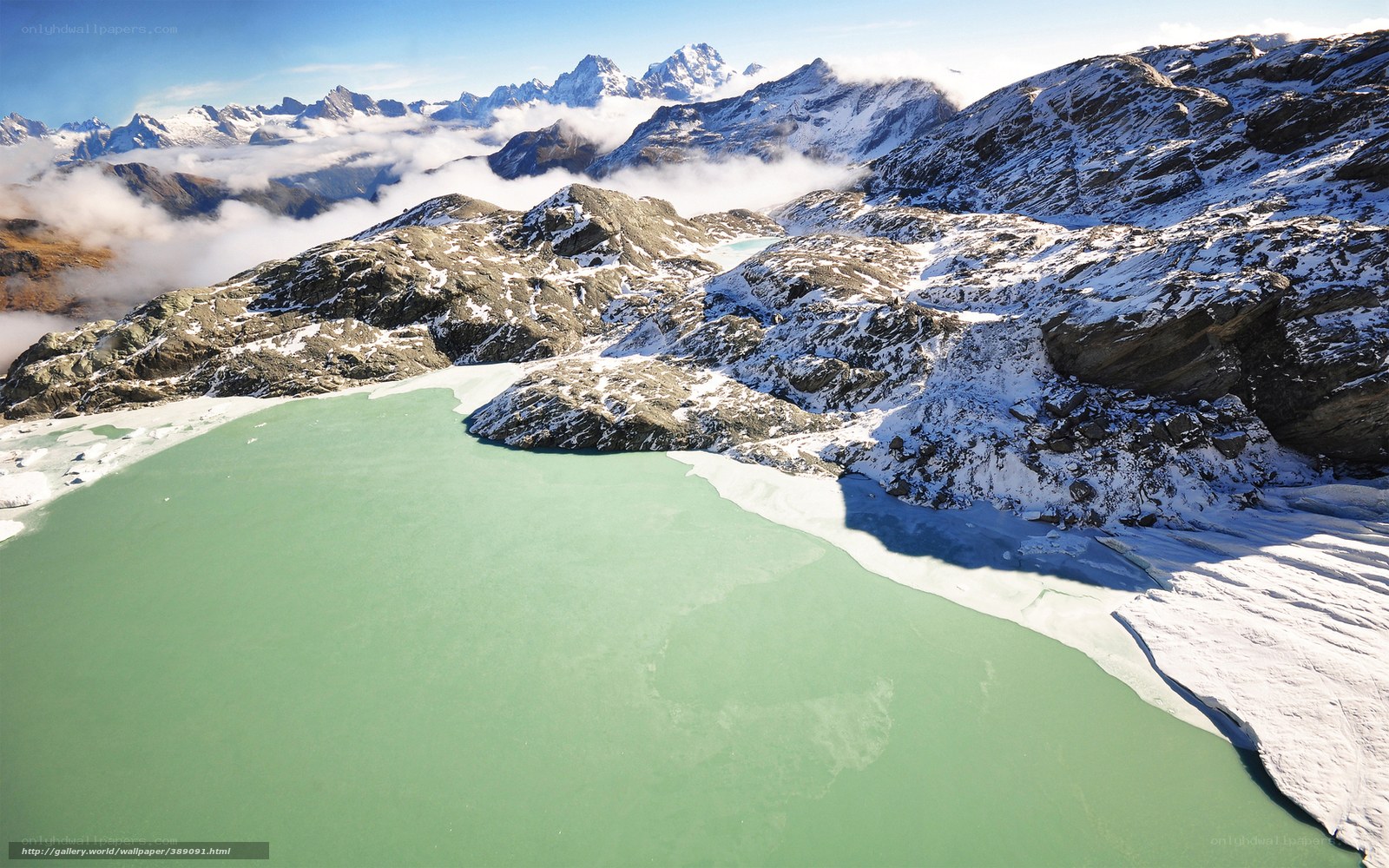 Snowy mountain lake landscape