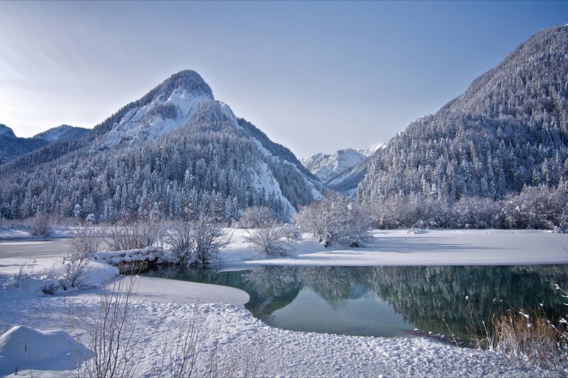 Snowy mountain lake landscape