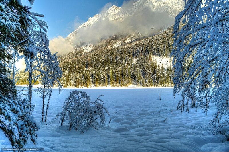 Snowy mountain lake landscape