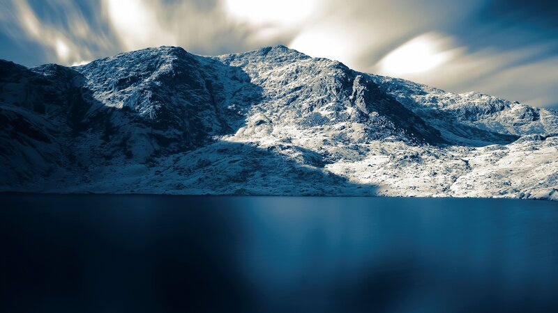 Snowy mountain lake landscape