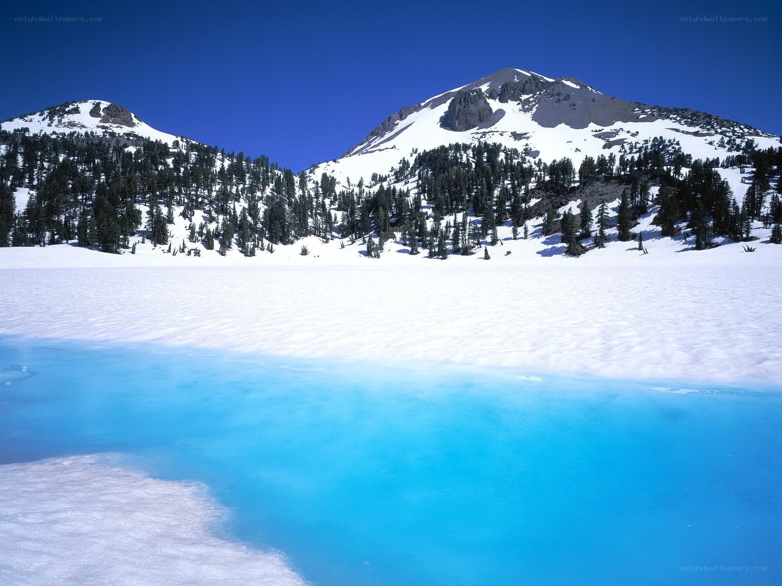 Snowy mountain lake landscape