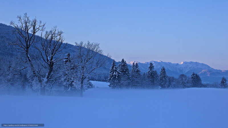 Snowy mountain landscape at dawn