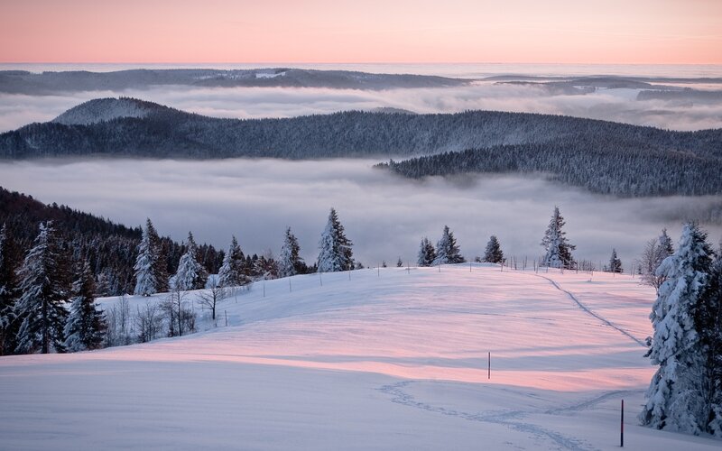 Snowy mountain landscape at dawn