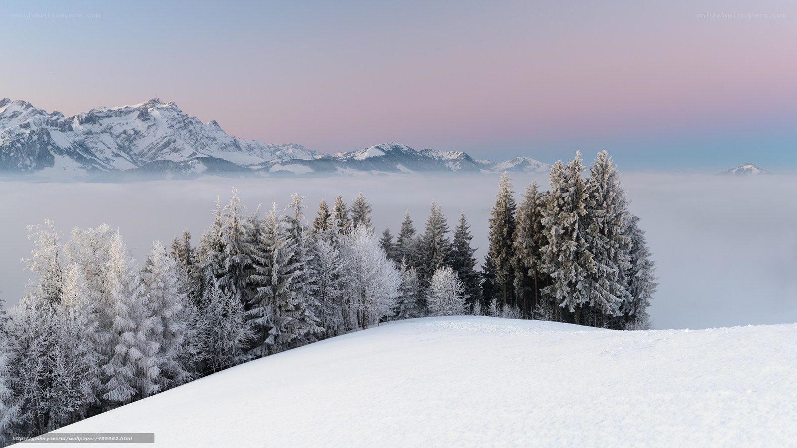 Snowy mountain landscape at dawn
