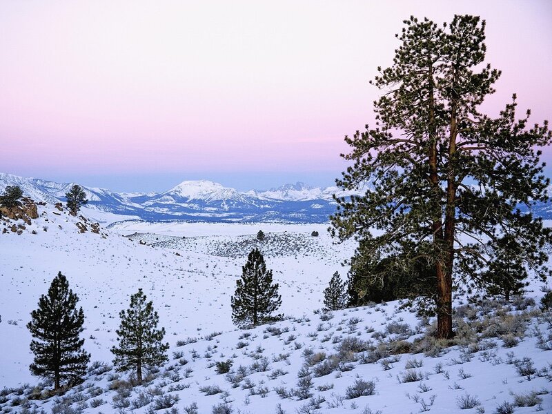 Snowy mountain landscape at dusk