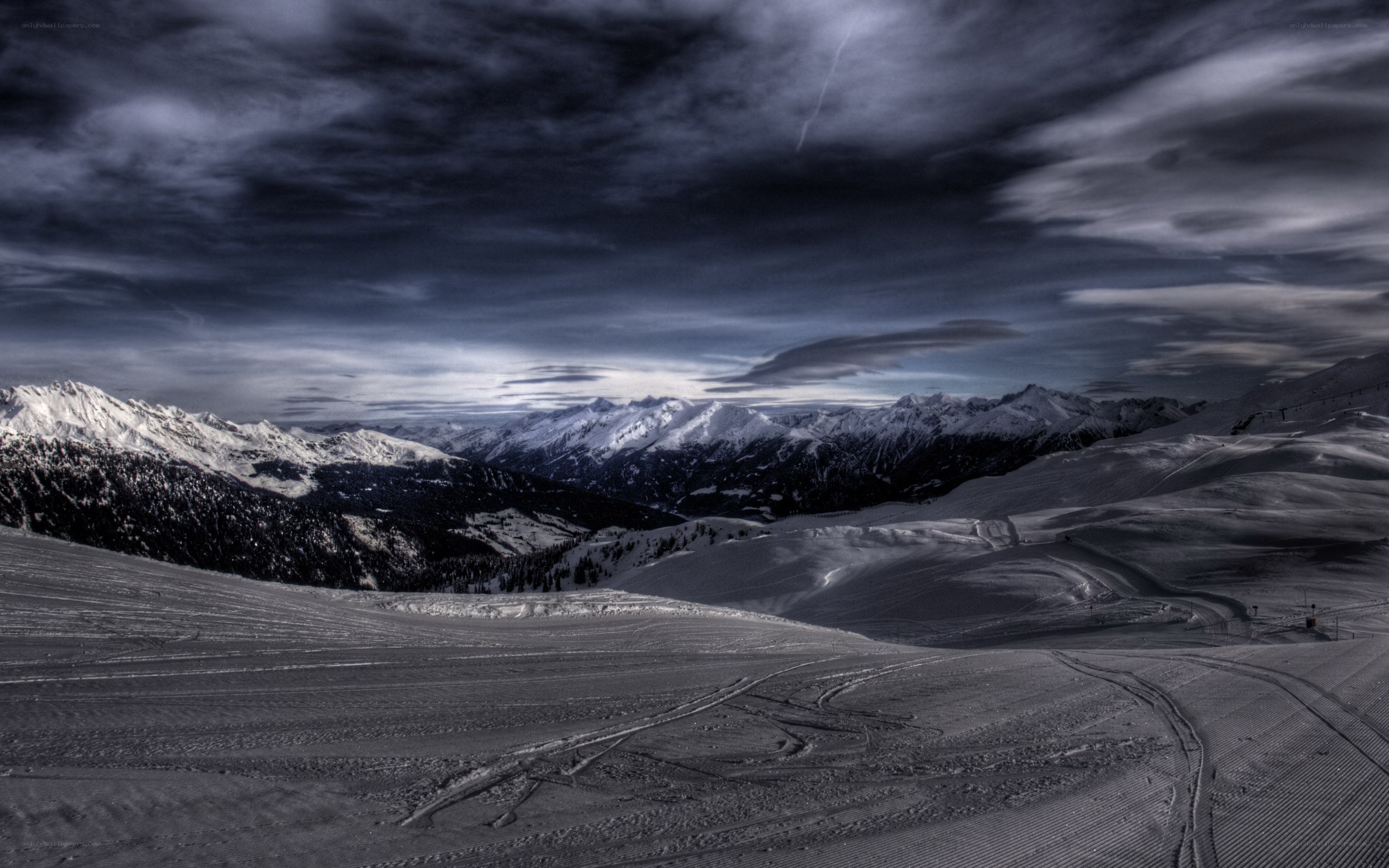 Snowy mountain landscape at dusk