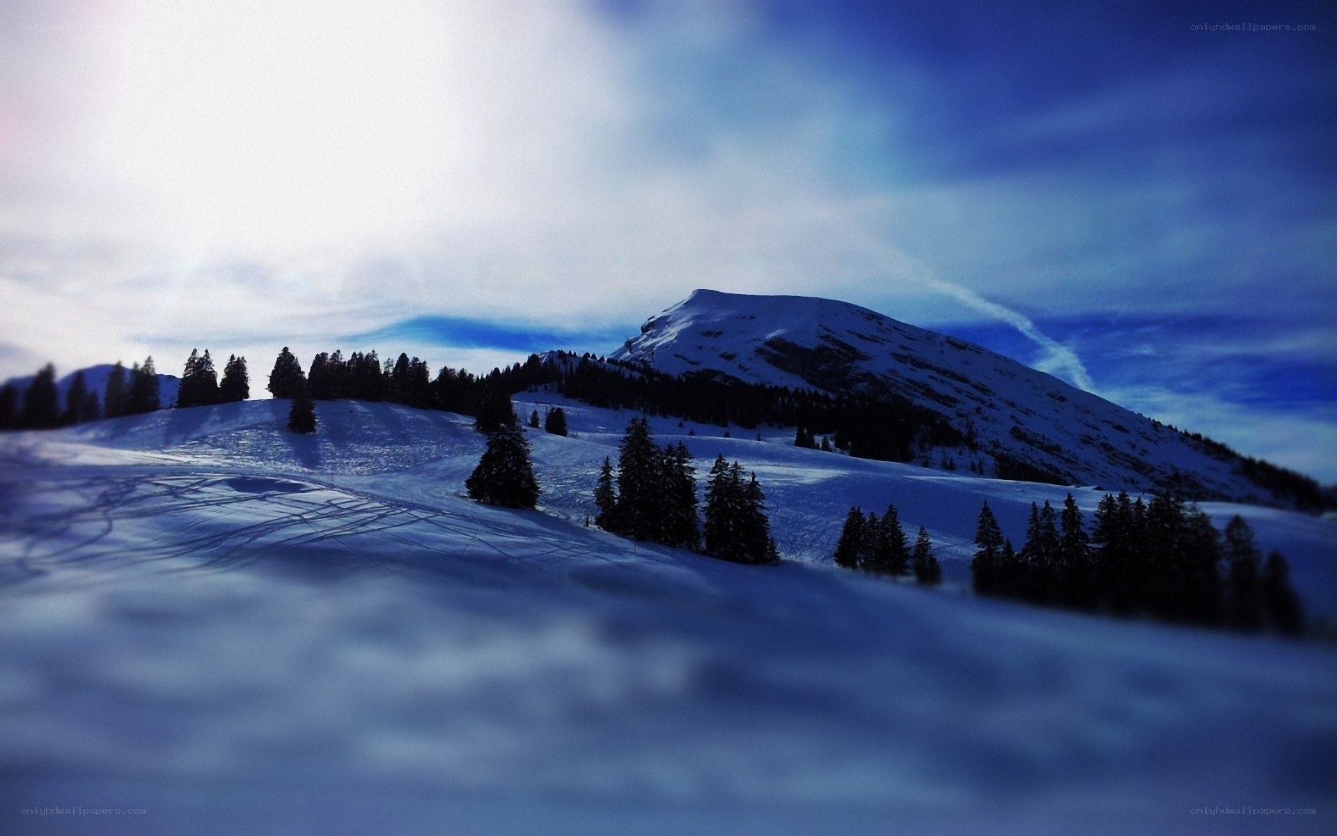 Snowy mountain landscape at dusk