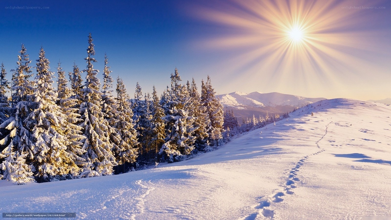 Snowy mountain landscape at sunrise