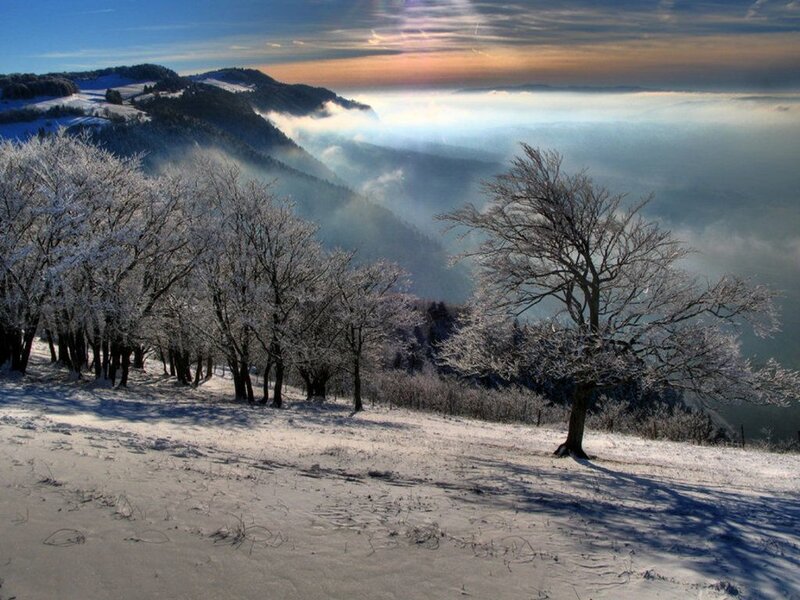 Snowy mountain landscape at sunrise