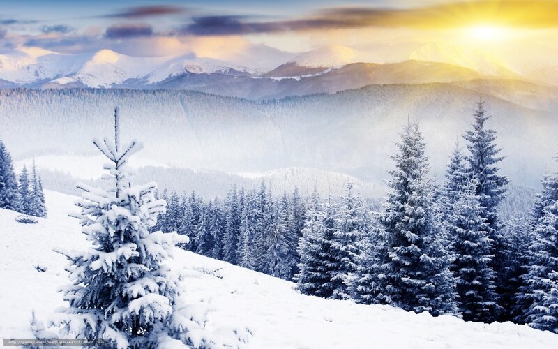 Snowy mountain landscape at sunrise