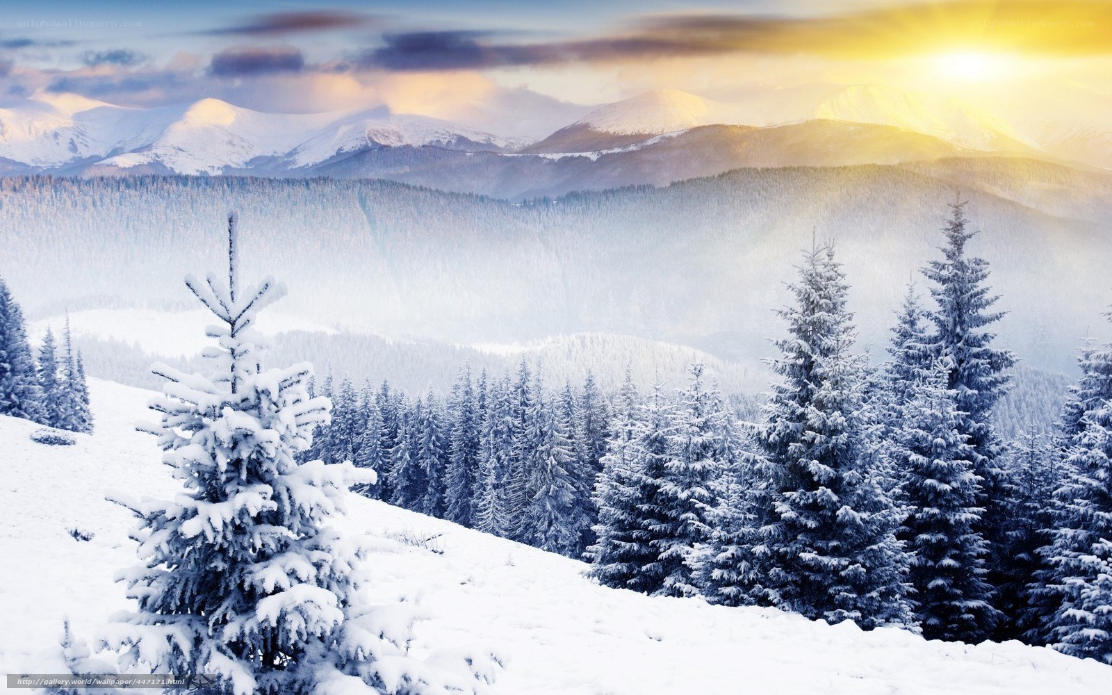 Snowy mountain landscape at sunrise