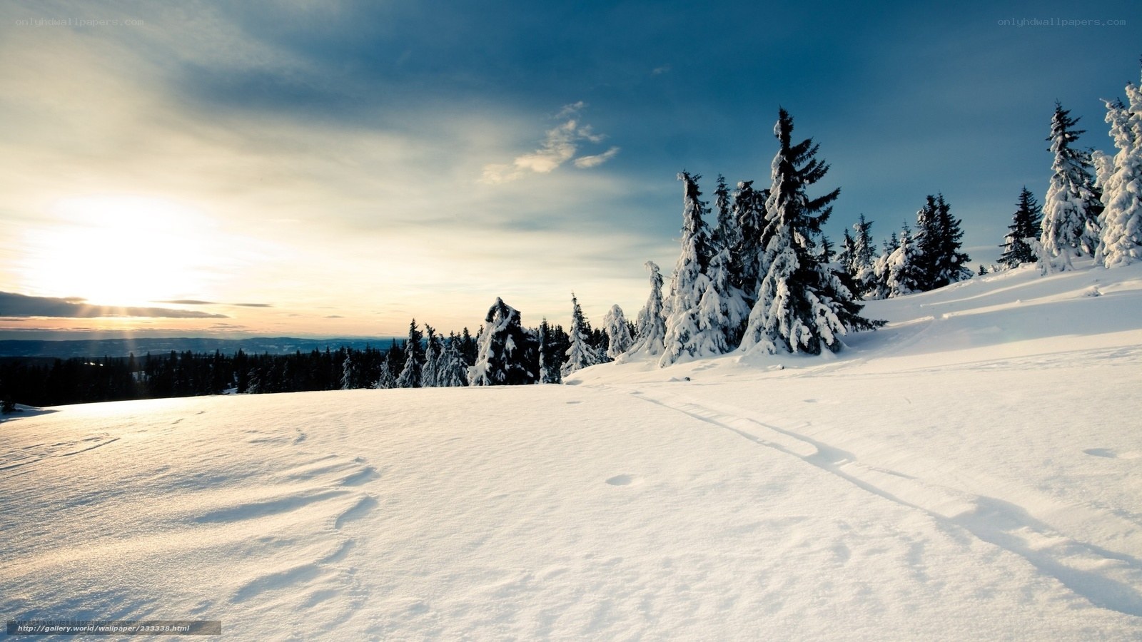 Snowy mountain landscape at sunset
