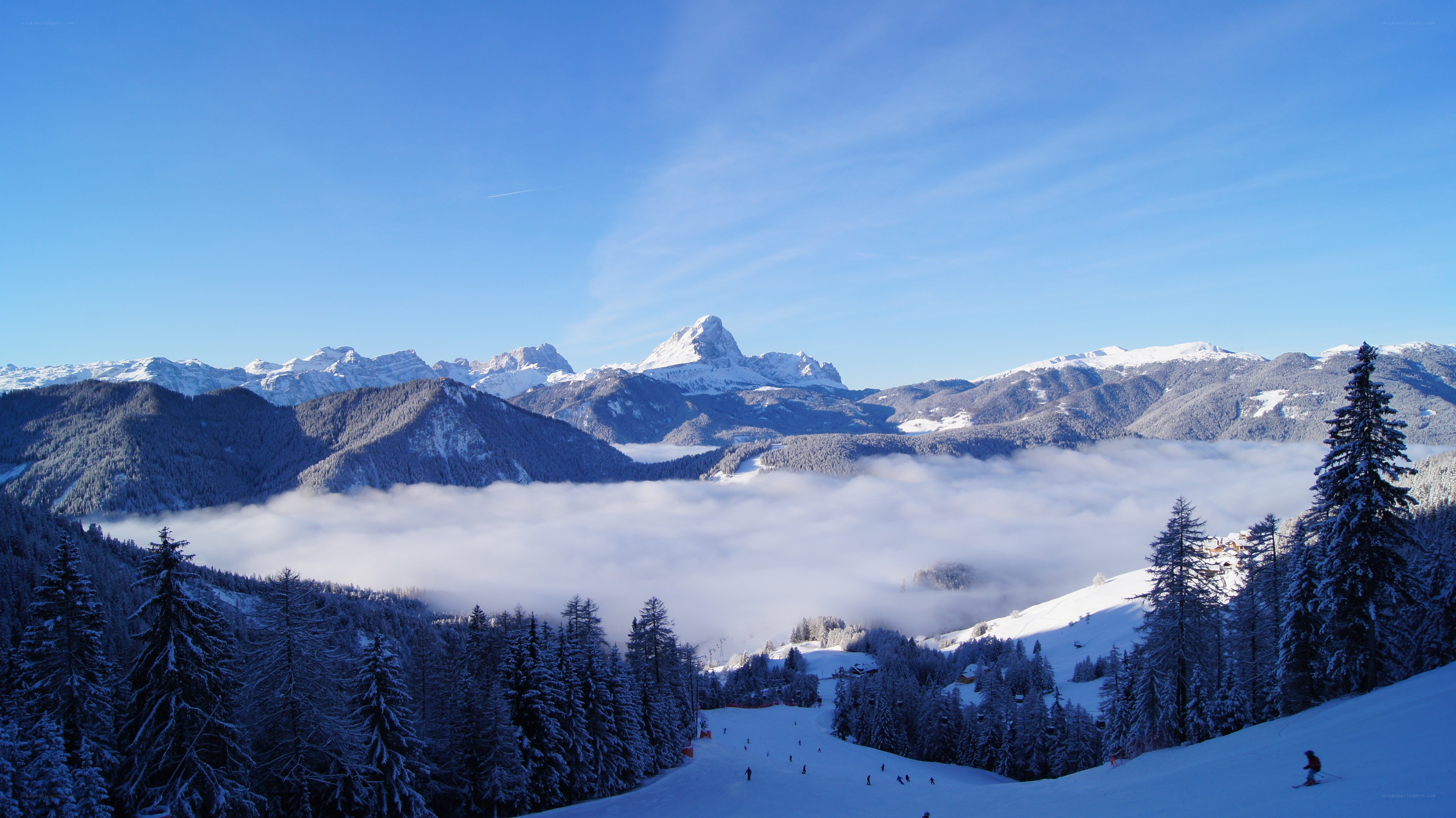 Snowy mountain landscape with fog