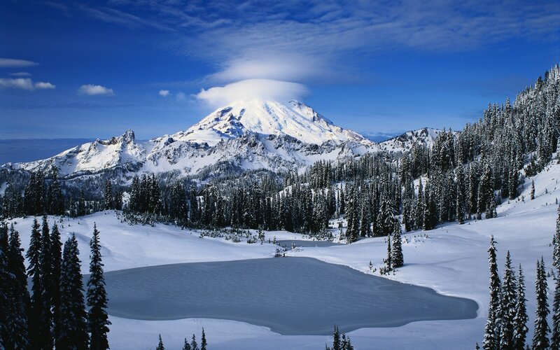 Snowy mountain landscape with lake