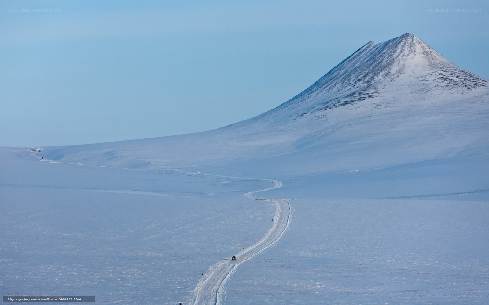 Snowy mountain landscape with road