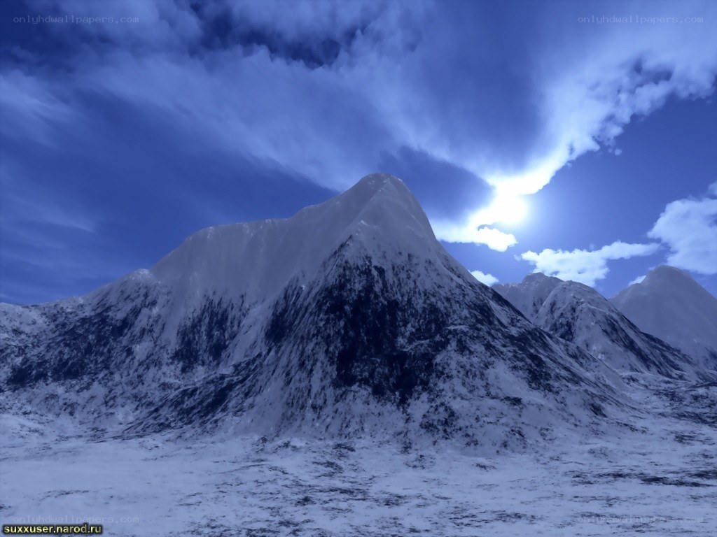 Snowy mountain peak at dawn