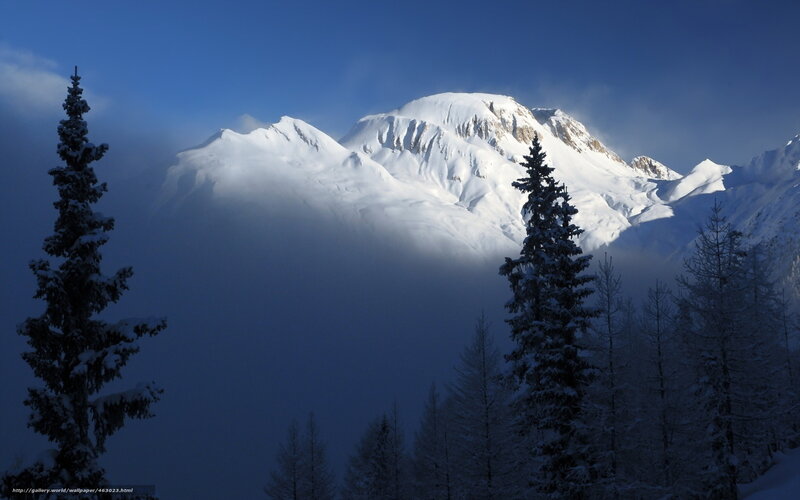 Snowy mountain peak at dawn