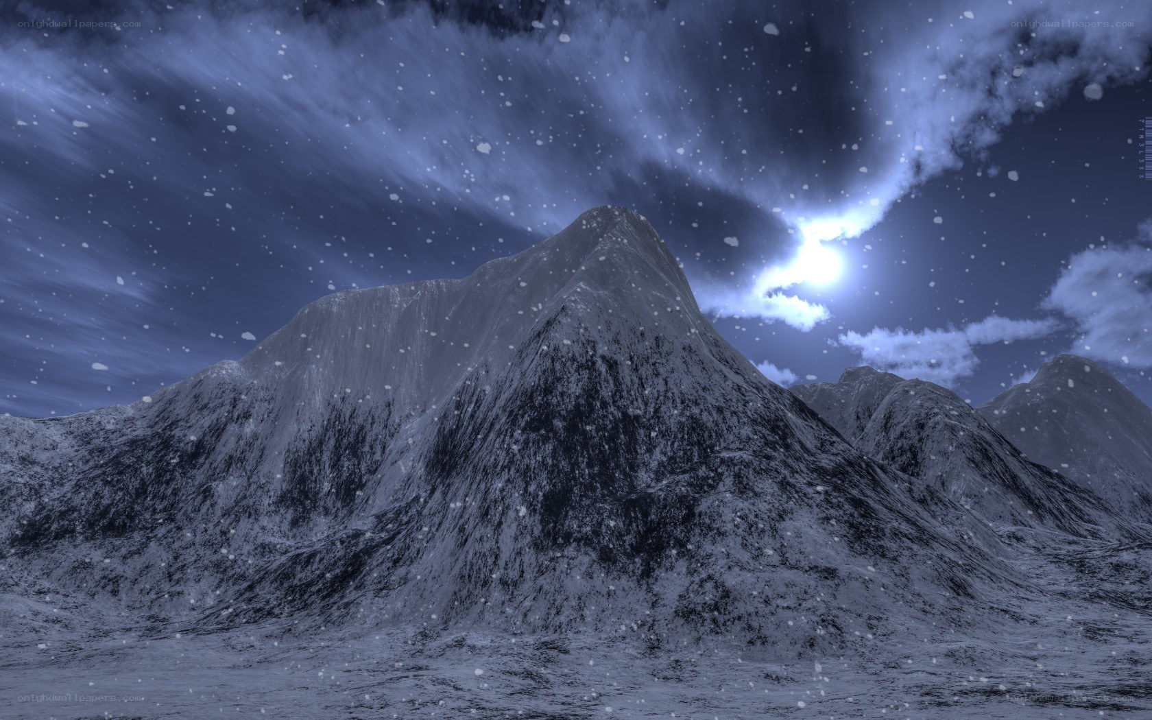 Snowy mountain peak at night