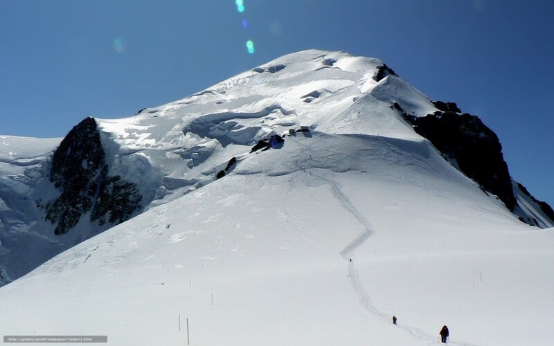 Snowy mountain peak with climbers