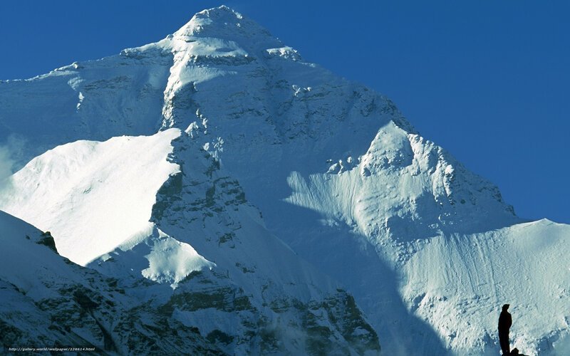 Snowy mountain peak with silhouette