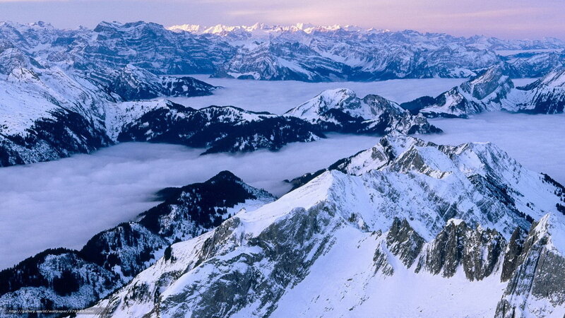 snowy mountain peaks at dawn