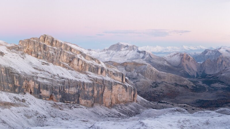 Snowy mountain peaks at dawn