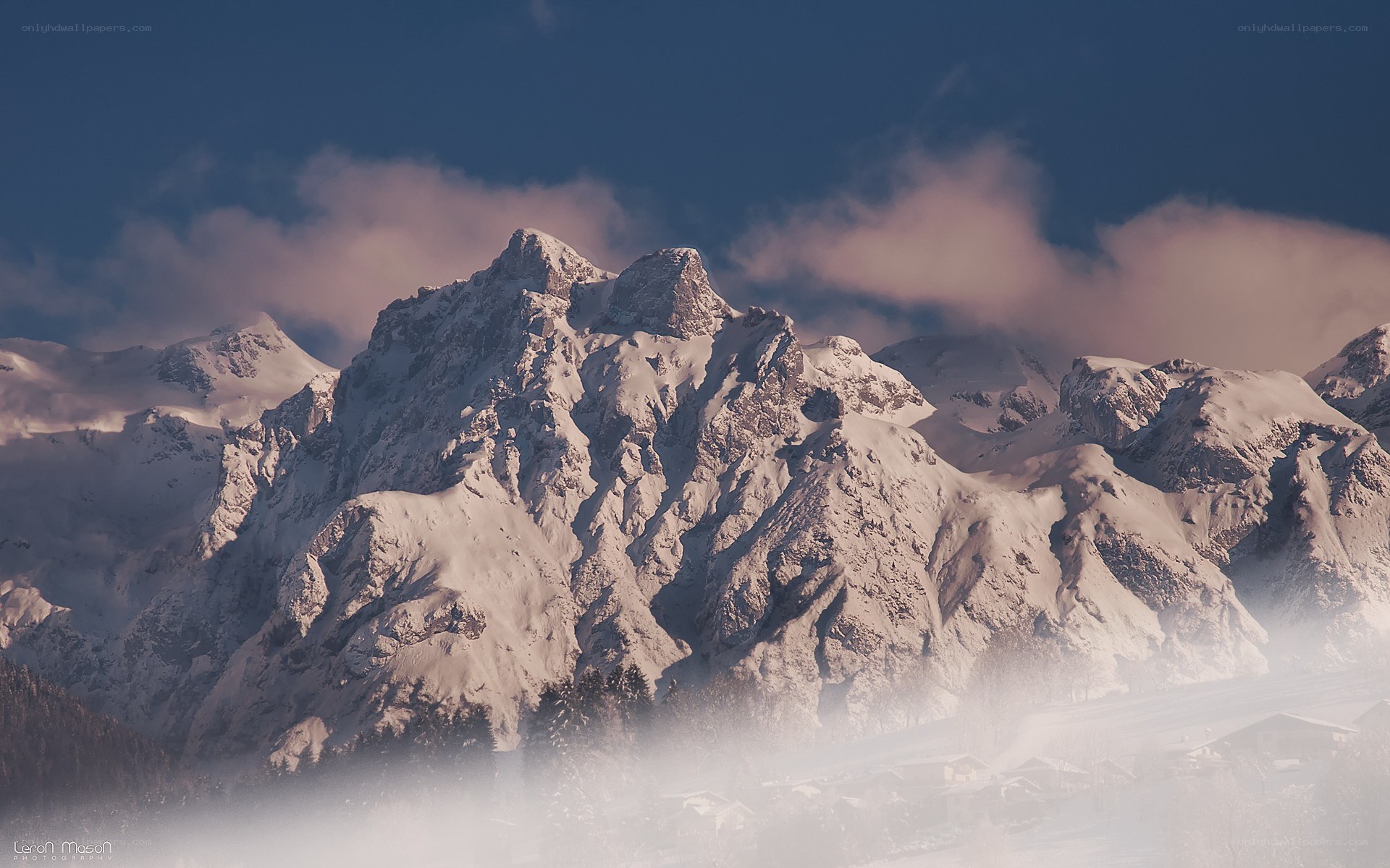 Snowy mountain peaks at dawn