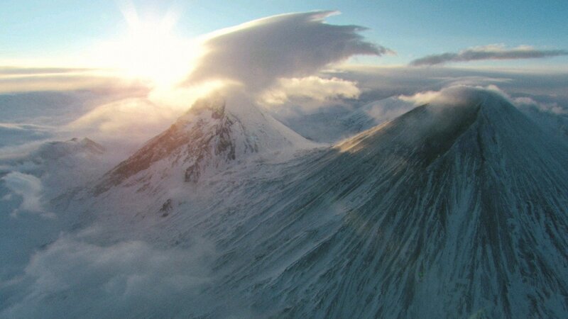snowy mountain peaks at sunrise