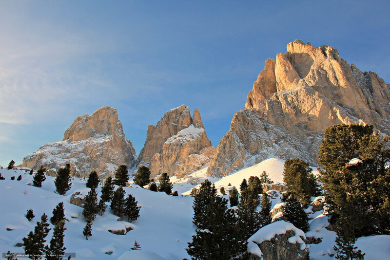 Snowy mountain peaks at sunrise