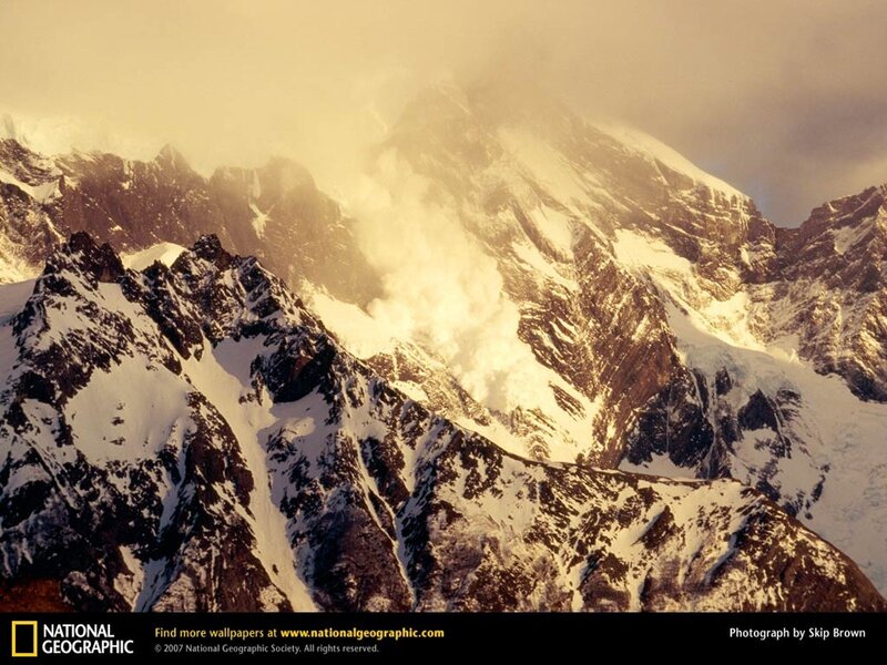 Snowy mountain peaks at sunrise