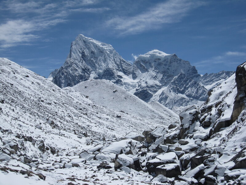 Snowy mountain peaks under blue sky