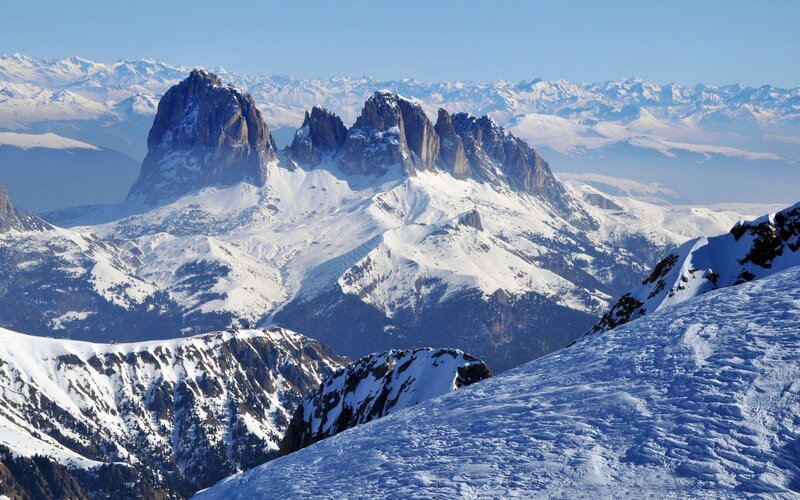 Snowy mountain peaks under blue sky