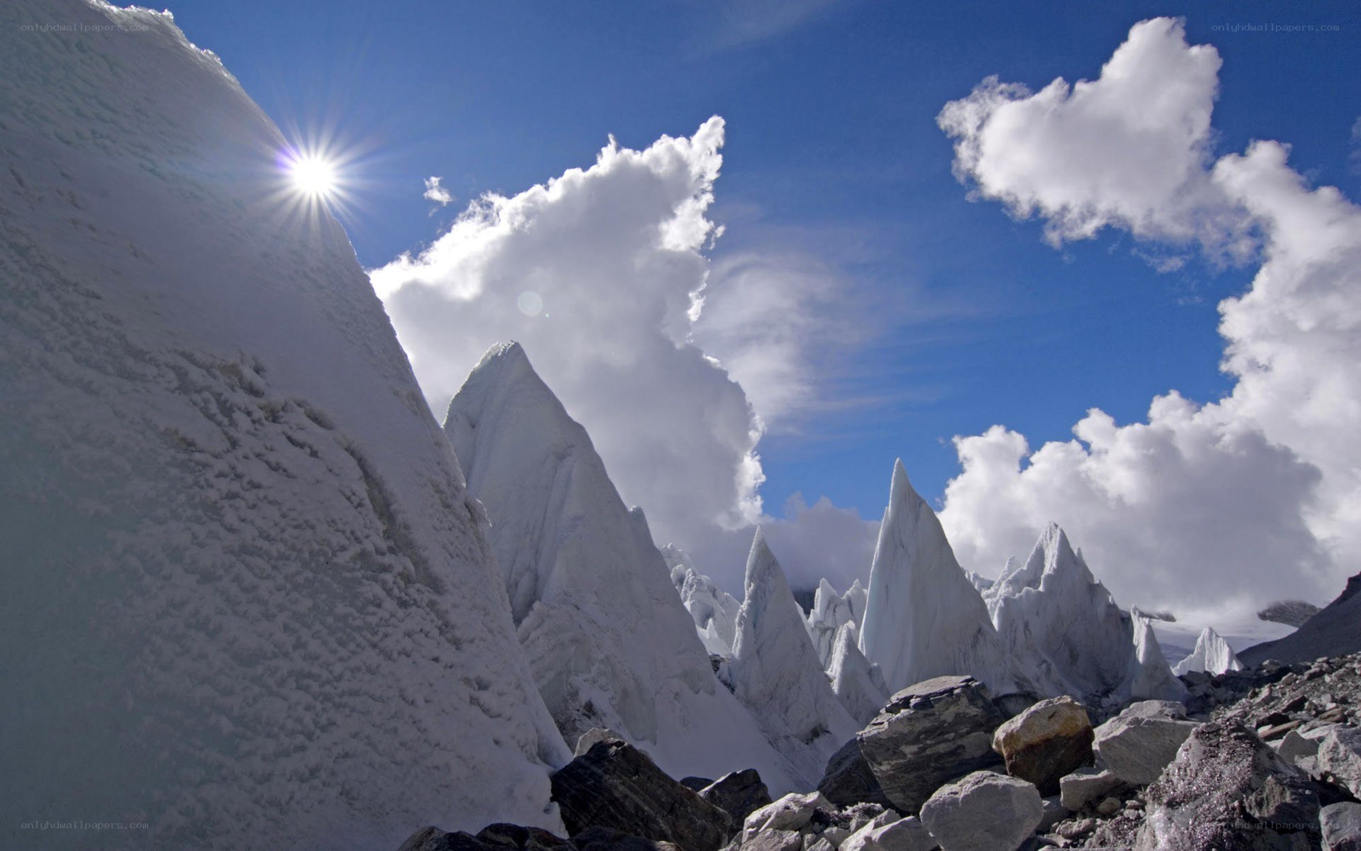 Snowy mountain peaks under blue sky