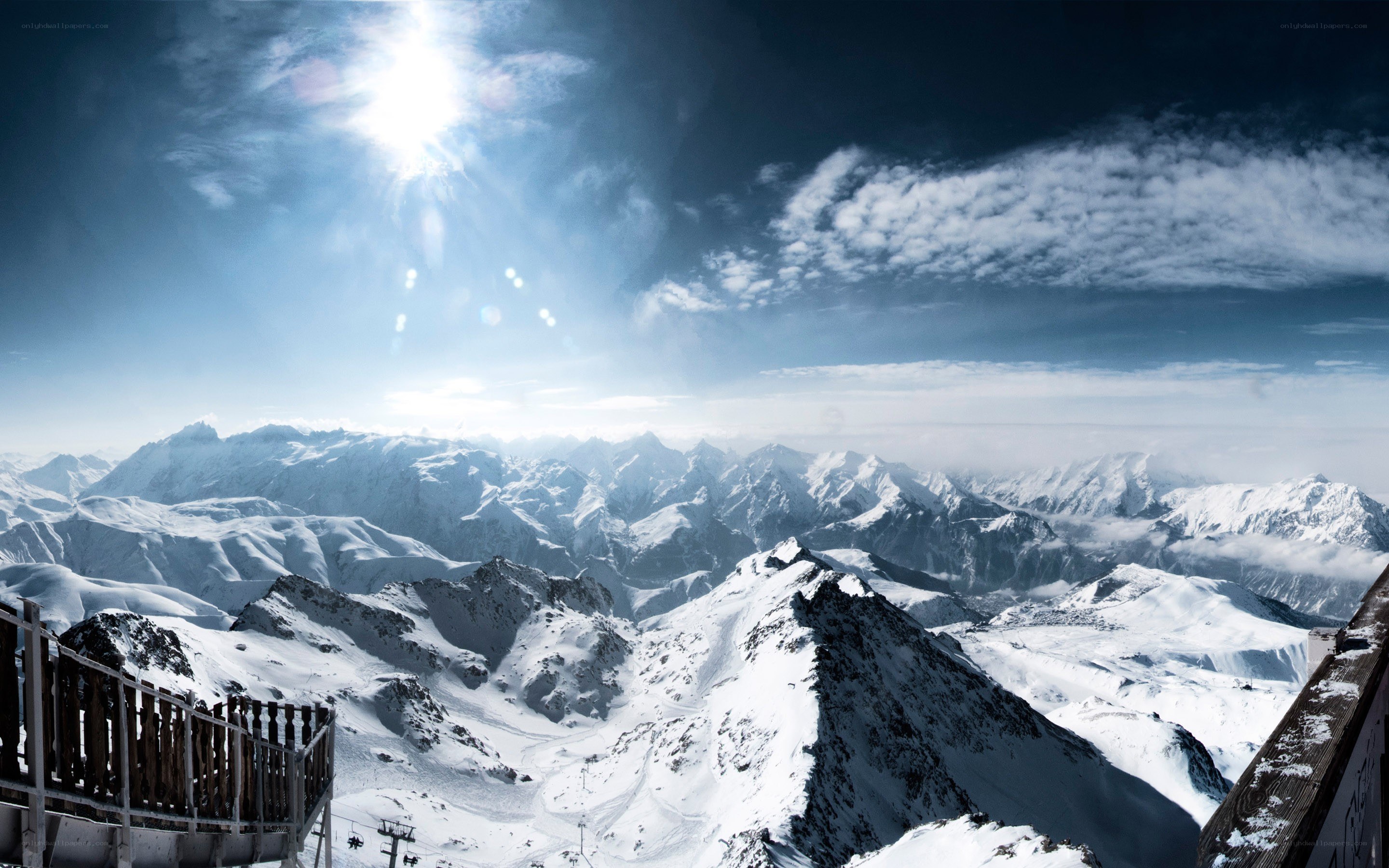 snowy mountain peaks under sun