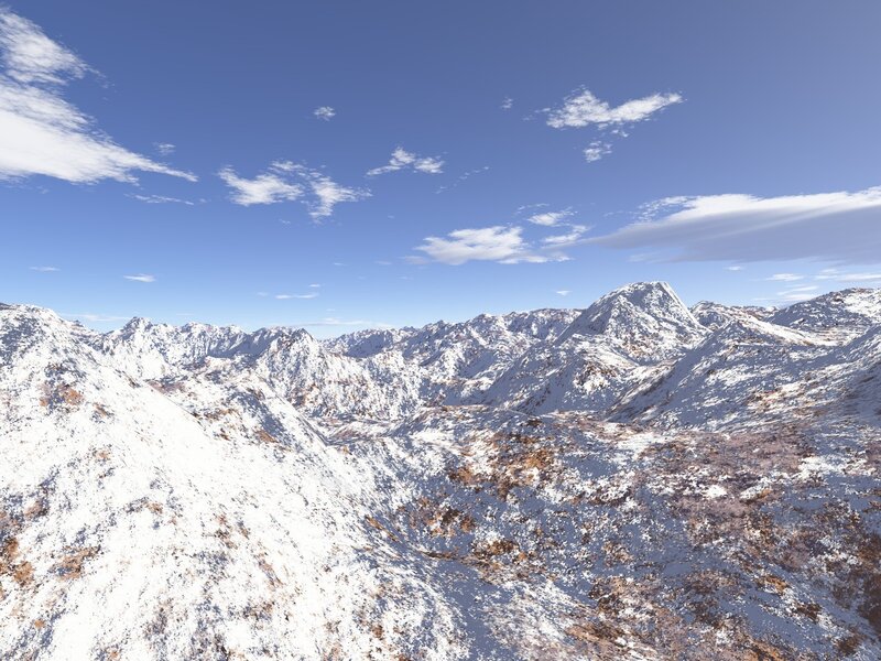 Snowy mountain range under blue sky